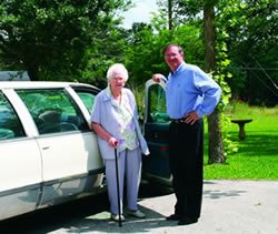Maggie Gibbons returns from a chauffeured trip to town.  All of Gouger’s homes have their own limousine and driver.