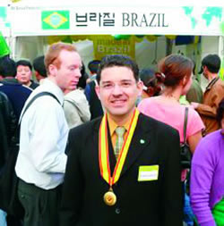 Dias wearing his citizenship medal.