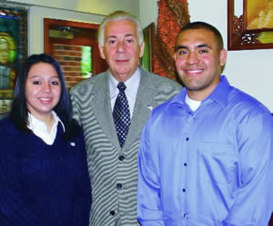 Hernandez (left) and Martinez (right) with President Agnese.