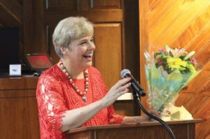 Moore speaks during a retirement celebration in April.